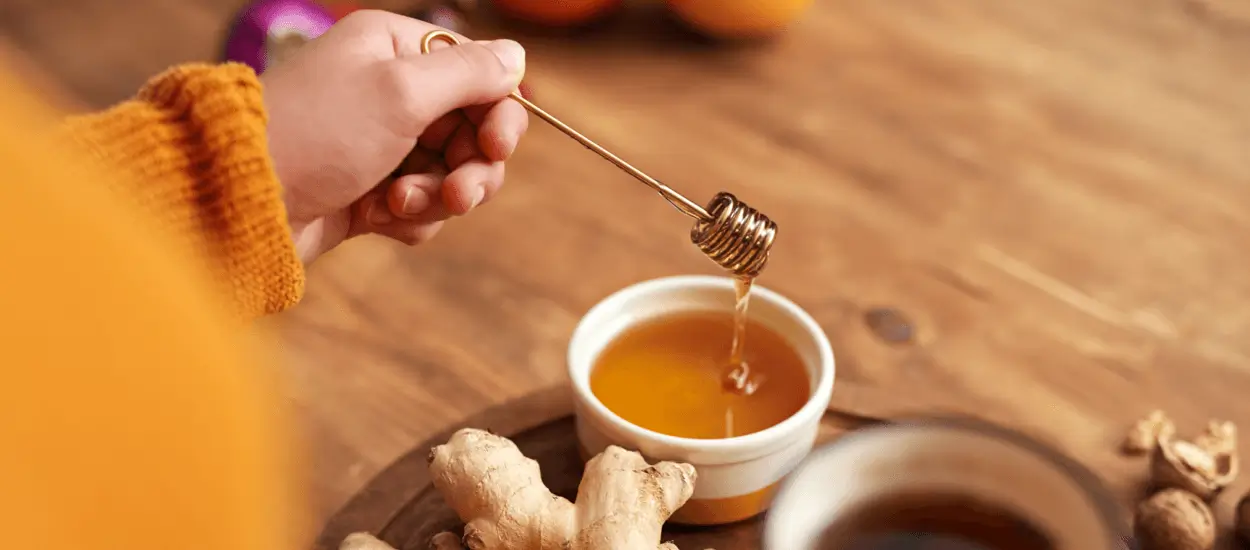 Honey, Ginger, Sliced Lemon and Tea In a Wooden Tray